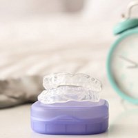 Mouthguard sitting on nightstand