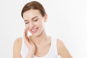Smiling woman, enjoying the benefits of BOTOX® treatment
