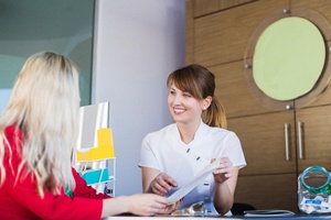 Patient learning about payment options for full mouth reconstruction