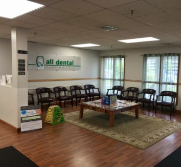 photo of dentist with patient