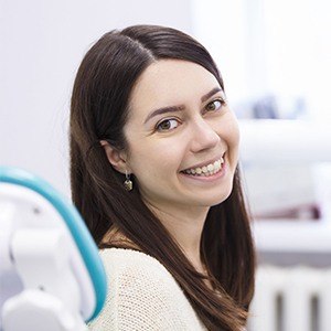 Woman smiling during preventive dentistry visit