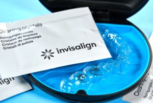 Invisalign aligner and packet of cleaning crystals