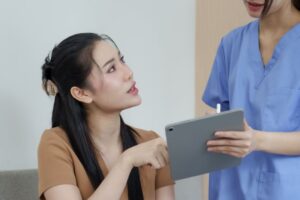 Curious dental patient asking about treatment plan